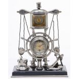 A French nickel plated brass nautical timepiece, late 19th c, with barometer, thermometer and