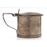 A William IV gadrooned silver mustard pot, blue glass liner, 70mm h, marks rubbed, London 1836, 4ozs