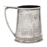 A E Jones. An Arts & Crafts silver mug, 84mm h, mark of A Edward Jones, Birmingham 1927, 4ozs