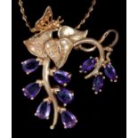 An amethyst flower pendant, in 14ct gold,  31mm, by The Franklin Mint, import marked London 1981 and
