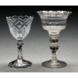 Two English sweetmeat glasses, c1780, with cut and scalloped flared or rounded bowl, on facet cut