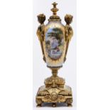 A French ormolu mounted porcelain vase, c1880, with demi figure handles, the slender oviform vase