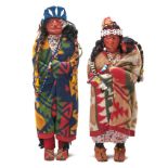 Two Skookum native American dolls, c1920, in original costume, the moccasins of suede applied to