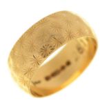 An 18ct gold  wedding band, London 1976, 6.8g, size L