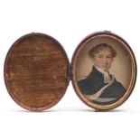 English School, 19th century - Portrait miniature of a Clergyman, watercolour and gum on card, oval,