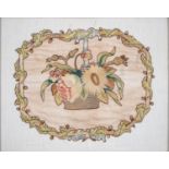 A regency embroidered silk basket of flowers screen banner, c1800, in entwined oak leaf surround,