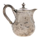 A George V silver hot milk jug, 11cm h, marks rubbed, by Vander & Hedges, London 1926, 7ozs 10dwts