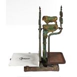 An Edwardian green and gilt painted cast and wrought iron butcher's shop counter scales, the