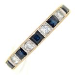 A sapphire and diamond ring,  with four evenly sized round brilliant cut diamonds alternating with