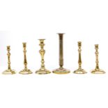 A pair of English brass candlesticks, 18th c, seamed, 22.5cm h, one and a pair of Victorian brass