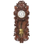 A German carved walnut Vienna wall timepiece, late 19th c, pendulum, 94cm h Good condition as