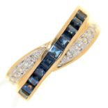 A sapphire and diamond entwined ring, with line of evenly sized round brilliant cut diamonds,