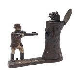 "Teddy and the Bear". A North American cast and painted iron mechanical bank, J & E Stevens Co,