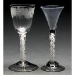 Two English wine glasses, c1770, with round funnel or trumpet bowl, the former engraved with