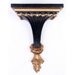 A black and gilt painted wall bracket, of recent manufacture, in Regency style, 33cm h Good