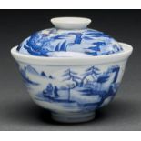 A Chinese underglaze red, blue and white bowl and cover, painted with continuous landscapes, bowl