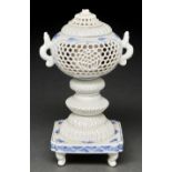 An Hirado reticulated blue and white vase and cover, Meiji period, 19.5cm h Lacks finial