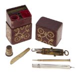 A Victorian gilt tooled morocco necessaire, containing a silver pencil and other accessories, 25cm