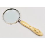 A Victorian ivy leaf carved bone handle and silver ferrule, fitted to a later magnifying glass, 25.