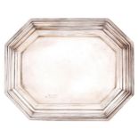 An Edwardian silver octagonal card tray, on bun feet, 16cm l, marks rubbed, Chester, early 20th c,