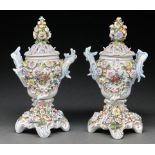 A pair of Sitzendorf floral encrusted rococo pot pourri vases and covers, late 19th c, with flower