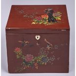 A Chinese brown lacquer tea chest, early 20th c, decorated in polychrome with birds and flowers, the