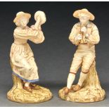 A pair of Royal Worcester figures of The Boy Piper Strephon and Companion, 1896, designed by James