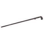 A Victorian iron air cane or 'poacher's gun', with black painted wood grips, 82.5cm l Surface