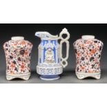 A pair of Coalport caddy form vases or lamp bases, 1880-1890, decorated with a floral japan pattern,