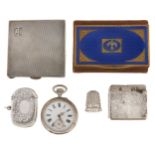 An Edwardian silver vesta case, 45mm, by T Heatley, Birmingham 1905, a silver compact, thimble in