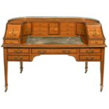 A Victorian satinwood, mahogany, inlaid and penwork Carlton House writing table, c1900, with brass