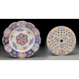 A Japanese Imari pot pourri dish and grid cover, Meiji period, lightly moulded in relief and