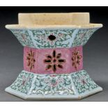 A Chinese hexagonal pink and turquoise ground famille rose lantern stand, 11.5cm h, commendation