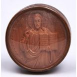 A carved wood medallion of Christ Pantocrator, late 19th / early 20th c, turned wood frame with