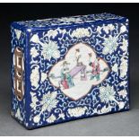 A Chinese famille rose pillow, 20th c, enamelled in turquoise with bats and lotus on blue ground,