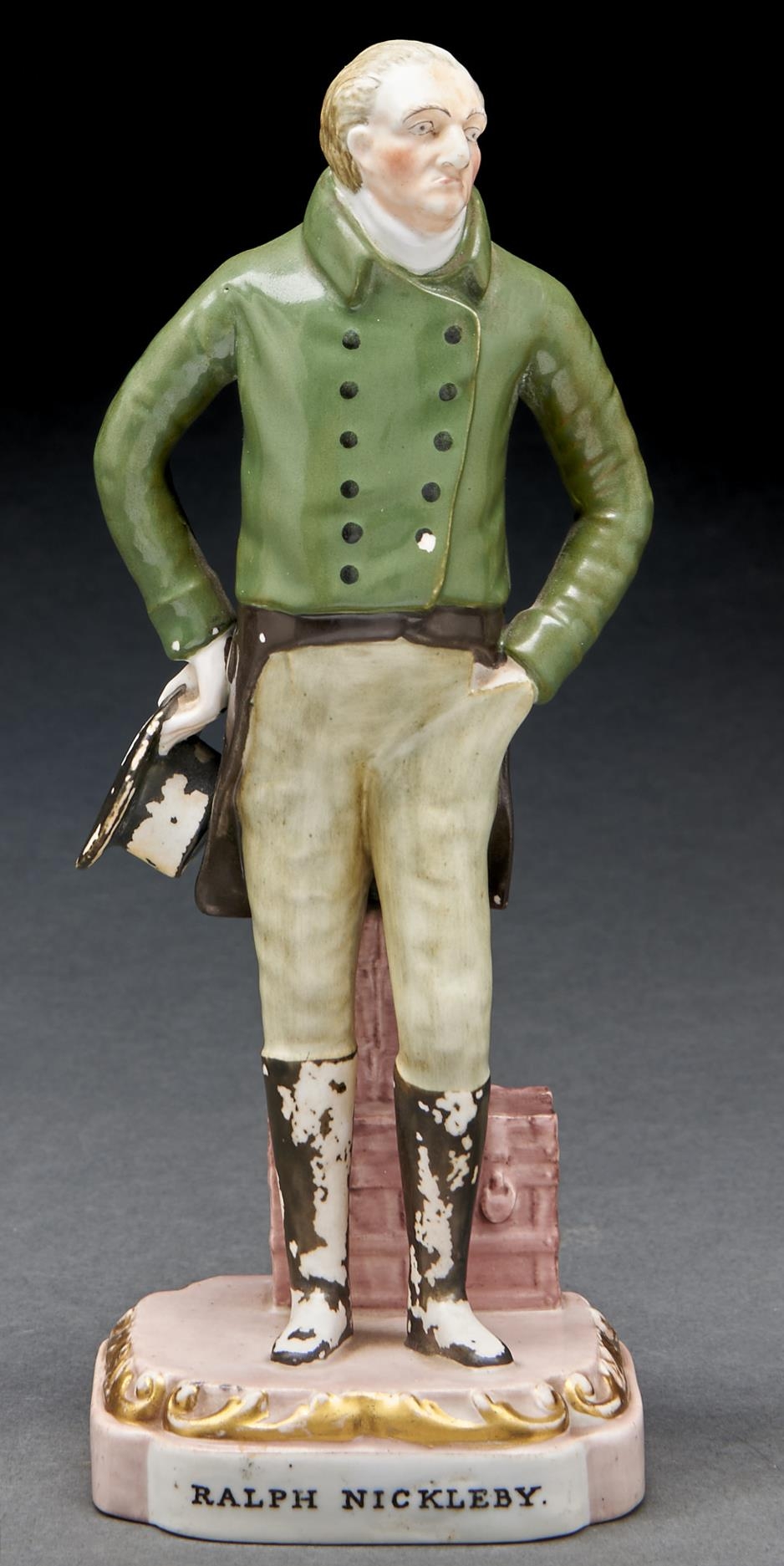 Charles Dickens interest. A Ridgway & Robey figure of Ralph Nickleby, 1839,  on gilt base, 21.5cm h,