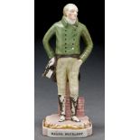 Charles Dickens interest. A Ridgway & Robey figure of Ralph Nickleby, 1839,  on gilt base, 21.5cm h,