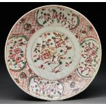 A Chinese iron red, green and black dish, Zhangzhou ware, 17th c, 33cm diam Wear to decoration;
