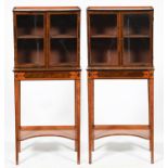 A pair of Edwardian satinwood and maple  cabinets, the upper part with galleried top and enclosed by