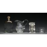 An English or Irish cut glass ogee preserve or honey jar and cover, c1800, 13cm h, two similar cut