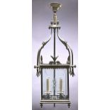 An Edwardian brass hall gas lantern, of square section, the sides inset with bevelled and cut