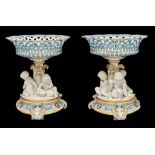 A Minton bone china dessert service, 1862, painted en grisaille with chocolate ground cameos and a