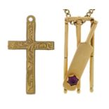 A ruby cricket bat and stumps pendant, in gold marked 750, 24mm, a gold cross marked 9ct and a