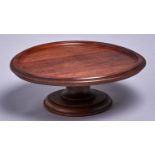 A turned mahogany lazy susan, dished top, 40cm diam Good condition