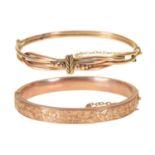 A Victorian 9ct gold bangle, 58mm (internal), Birmingham 1899 and another of entwined form, marked