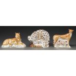 Snow Leopard, Cheetah and Lioness. Three Royal Crown Derby paperweights, early 21st c, 12.5cm h