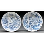Two Southern Chinese blue and white saucer dishes, 19th c, painted with phoenix and peony, 24.5cm