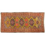 An antique Bakshaish Kheyli rug, early 20th c, 195 x 465cm Good condition
