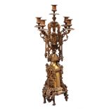 A French gothic gilt lacquered brass candelabrum, 19th c,  of five lights, 60cm h Dirty but