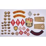 Militaria. A quantity of British Army brass and other tunic buttons, cap badge and cloth insignia,